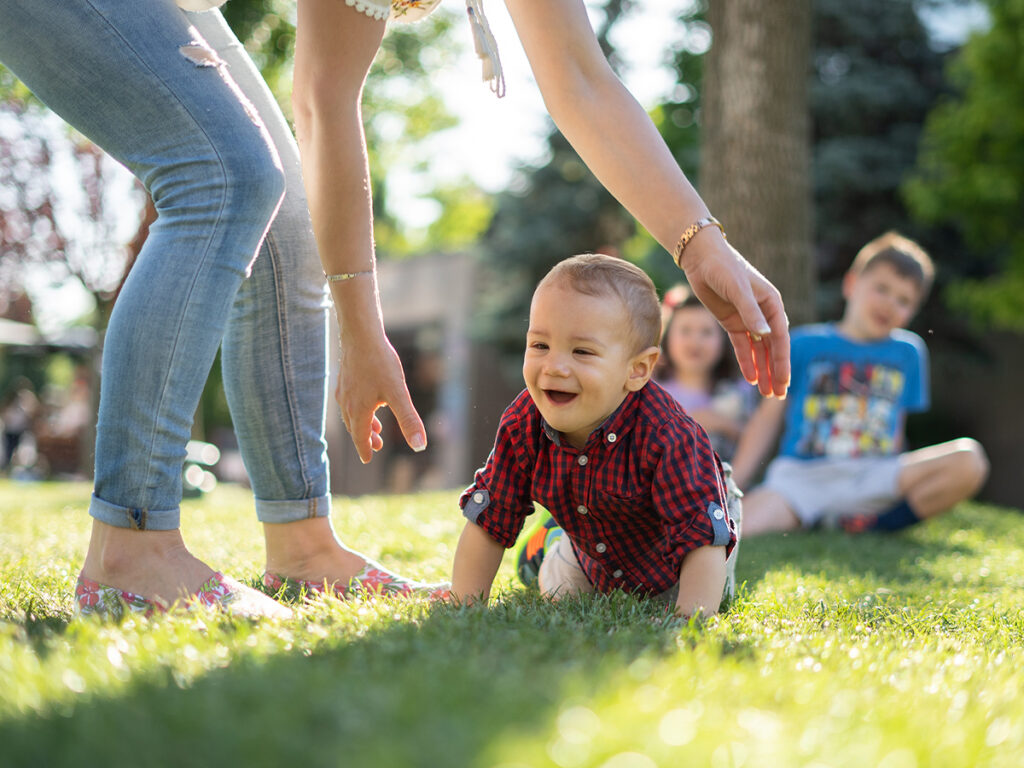 Worry-free family having fun in their yard